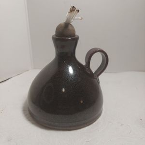 Stoneware oil lamp signed by artist